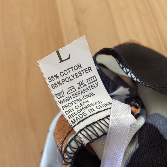 Cheeta print skirt, worn once. Blue, black, brown, and cream. Good condition. - Picture 8 of 10